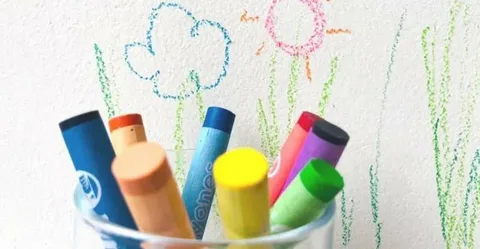How do I remove crayons from the wall